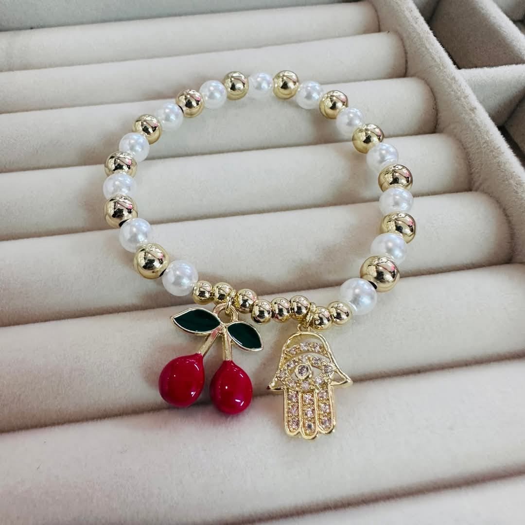 PULSERAS DE RESORTE CEREZA CON DIJE