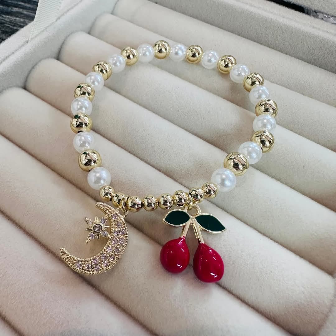 PULSERAS DE RESORTE CEREZA CON DIJE