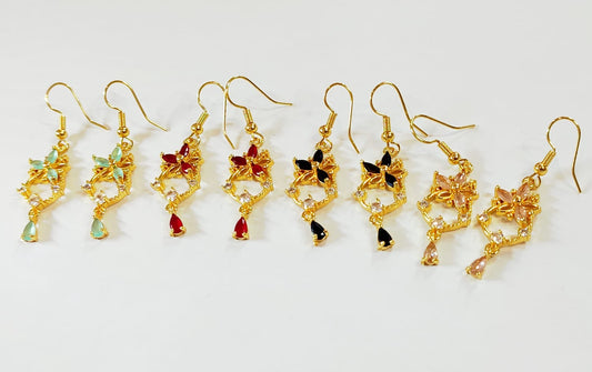 ARETE MEDIO LARGO DE ANILLO DE FLOR